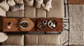 high-angle shot looking down on the coffee table and sofa. selective focus