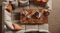 A high-angle shot looking down on the coffee table and sofa. Selective focus