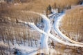 high angle shot of meandering snowboarding trail