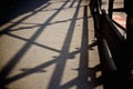 High angle shot of metal railings shadow on the ground