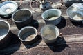 High angle shot of old kitchenwares on a mat under the sunlig Royalty Free Stock Photo