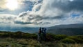 High angle shot of a pair of mountain bikers enjoying the view from the French mountains