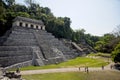 High angle shot of people visiting Zona Arqueologica Palenque (Palenque Ruins) in Mexico