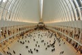 High-angle shot of people walking on the base floor of Oculus shopping center in New York