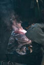 High angle shot of a person welding different metal elements