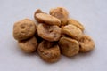 High angle shot of a pile of dried figs on a white surface Royalty Free Stock Photo