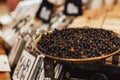 High angle shot of quinoa black grain on a flat container