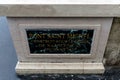 High angle shot of the sign with text regarding foundation of bridge Saint Michel in Paris