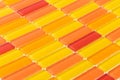 High angle shot of small yellow, red and orange tiles - good for a background Royalty Free Stock Photo