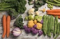 Raw vegetables on a white rustic wooden table Royalty Free Stock Photo