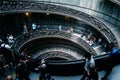 High angle shot of the Spiral Stairs in the Vatican Museum, Rome, Italy, while people go downstairs Royalty Free Stock Photo