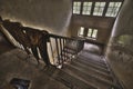 High angle shot of a staircase inside an old abandoned building Royalty Free Stock Photo