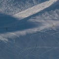 High angle shot of the traces of skates on the snowy frozen ground