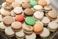 High angle shot of a tray of different types of macaroons