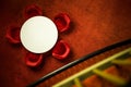 High angle shot of a white round table with red chairs Royalty Free Stock Photo