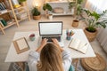 Top view mockup image of a woman working and typing on laptop computer with blank screen at home Royalty Free Stock Photo