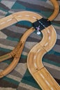 High angle shot of wooden toy train tracks on the carpet Royalty Free Stock Photo