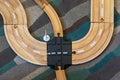 High angle shot of wooden toy train tracks on the carpet Royalty Free Stock Photo