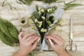 Woman arranging a bunch of mistletoe