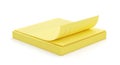 Vivid yellow memo pad with a peeled corner reveal Royalty Free Stock Photo