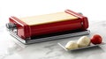 Red Pasta Machine with Dough Ready for Rolling Royalty Free Stock Photo