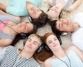High angle of teenagers listening to music Royalty Free Stock Photo