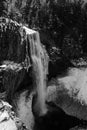 High angle vertical grayscale shot of a mesmerizing waterfall Royalty Free Stock Photo