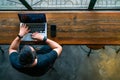 High angle view of Asian man using laptop Royalty Free Stock Photo