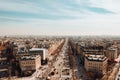 High angle view of The Avenue des Champs-Elysees under a cloudy sky and sunlight in Paris Royalty Free Stock Photo