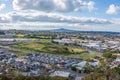 High angle view of the beautiful Auckland city stretching to the horizon under the clouds