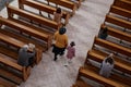 Believer people praying in church