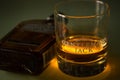 High-angle view of a bottle of Gentleman Jack and a glass of whiskey Royalty Free Stock Photo