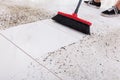 Broom Cleaning Dirt On Tiled Floor