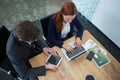 High angle view of business executives working at desk Royalty Free Stock Photo