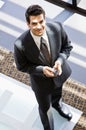 High angle view of businessman with cell phone Royalty Free Stock Photo