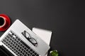 High angle view of businessman desk with organizer, pen, glasses and laptop. Top view of office supplies on blackboard background Royalty Free Stock Photo