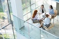 High angle view of businesswomen discussing at table in office Royalty Free Stock Photo