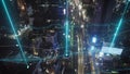 High angle view of busy multilane thoroughfare in modern metropolis. Aerial evening shot of traffic in streets of city