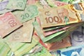 High Angle View of Canadian Banknotes of Different Values with a Large Stack of Bills on Top Royalty Free Stock Photo