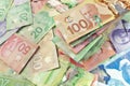High Angle View of Canadian Banknotes of Different Values with a Large Stack of Bills on Top Royalty Free Stock Photo