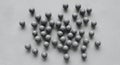 Abstract gray spheres scattered on concrete texture Royalty Free Stock Photo