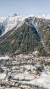 Aerial drone view of Chamonix city at the foot of snow covered Alps mountain brevent Royalty Free Stock Photo