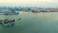 high angle view of chaopraya river and shipping dock against city scape of bangkok skyscraper Royalty Free Stock Photo