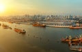 high angle view of chaopraya river and shipping dock against city scape of bangkok skyscraper Royalty Free Stock Photo