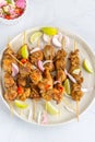 High Angle View of Chicken Satay with Peanut Sauce and Salad Popular Indonesian and Thai Appetizer. Thai Food, Oriental Cuisine,