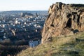 High angle view of the City of Edinburgh against skyline from cliffs of Salisbury Crags near Arthur\'s Seat Royalty Free Stock Photo