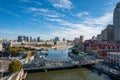 High-angle view of a city full of skycrapers under the blue sky.