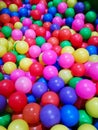 High angle  view of   colored plastic balls in pool of game room Royalty Free Stock Photo