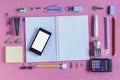 High Angle View of Colorful School Supplies Organized by Type Around Note Book Royalty Free Stock Photo