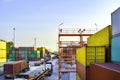 High angle view of container yard operation, heavy equipment reach stacking loading up container to truck and trailer. Royalty Free Stock Photo